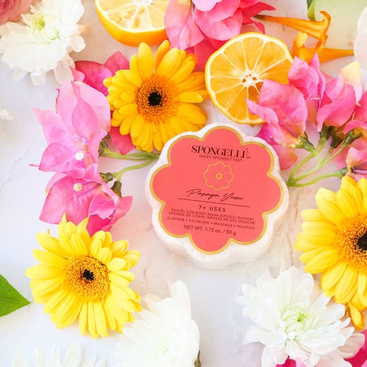 Daisy Collection Spongette body wash infused sponge with built-in cleanser in a soft beige color.