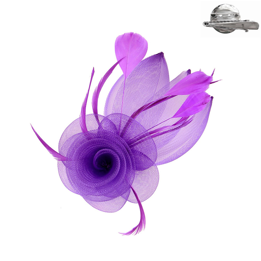 Black mesh fascinator with white floral print featuring a decorative clip attachment.