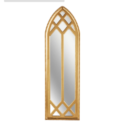Tall gold arched mirror with a decorative lattice overlay and beaded frame detail.