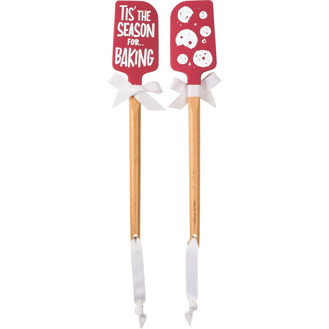 Wood-handled silicone spatula with red Christmas-themed grip.