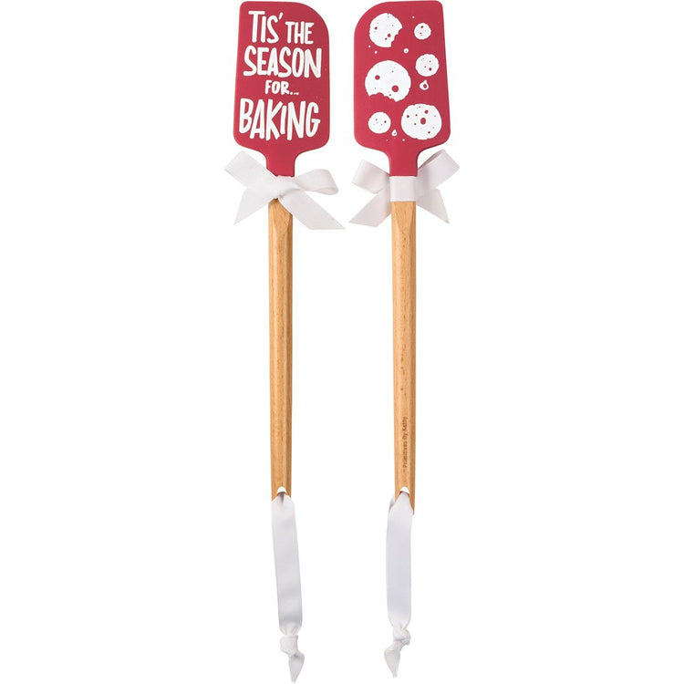 Wood-handled silicone spatula with red Christmas-themed grip.