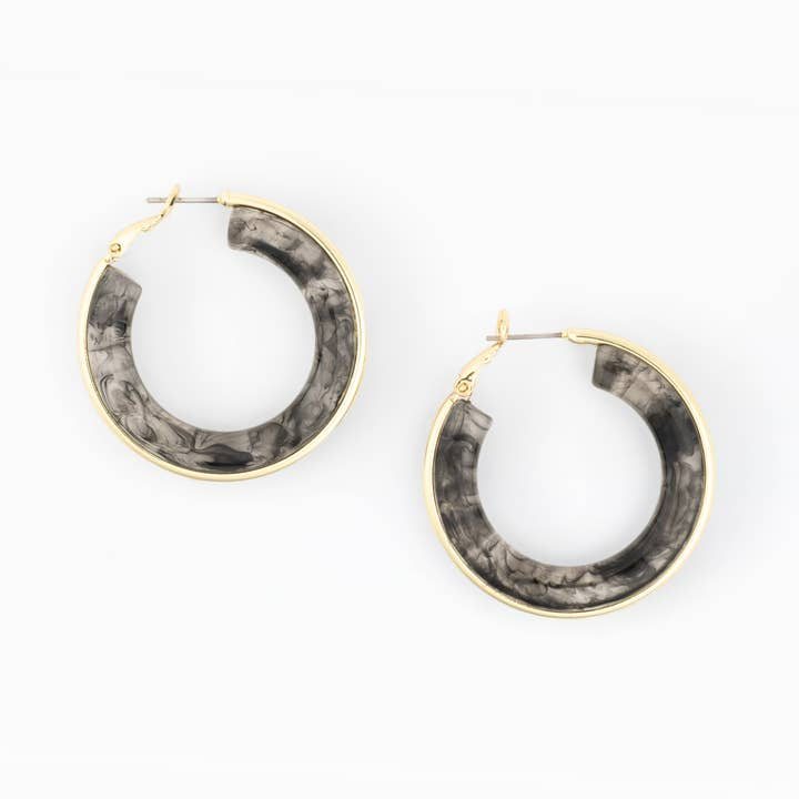 Esme hoop earrings featuring a grey marbled resin design with gold-plated metal trim.