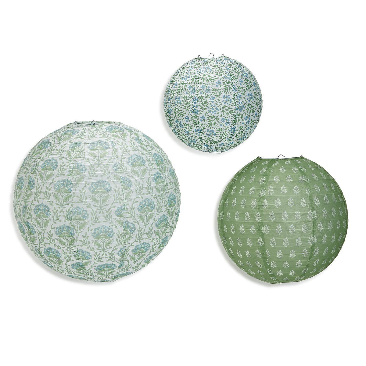 Set of white paper lanterns with a countryside-inspired rustic design.
