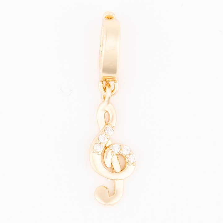 Gold treble clef charm with small clear crystals on a gold hoop.