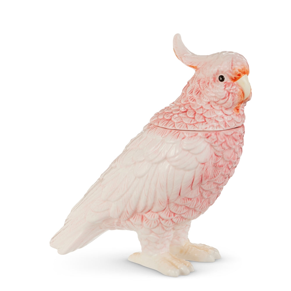 Pink ceramic container shaped like a cockatoo with dimensions 7.5 inches long by 3.5 inches wide.