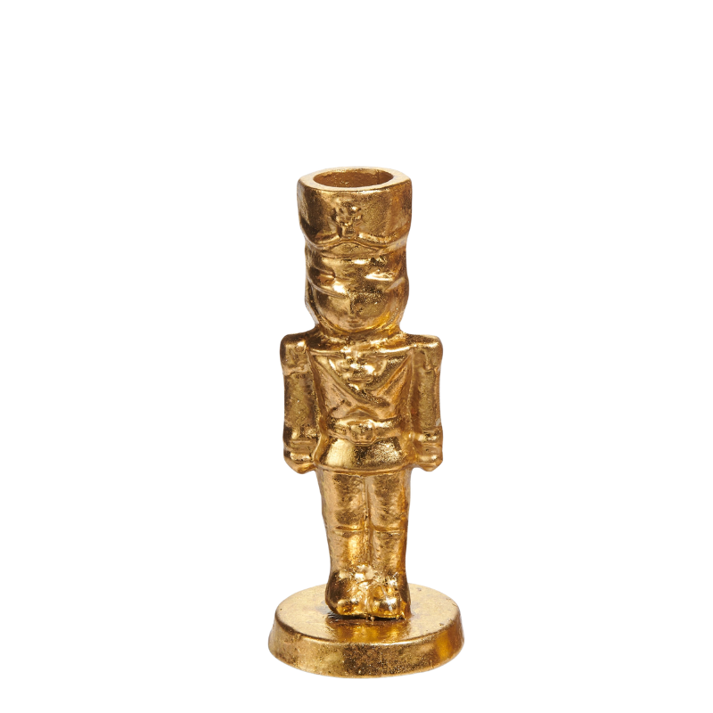 Gold iron nutcracker candlestick holder with a classic soldier design and a round base.