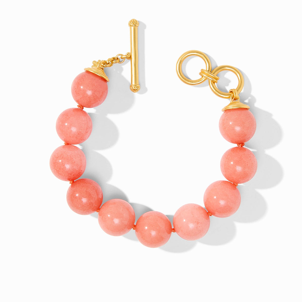Polished beaded bracelet with jade accents on a toggle clasp