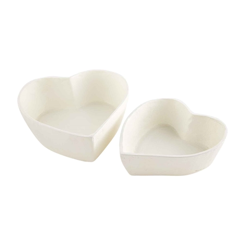 Two white heart-shaped ceramic bowls, one slightly larger than the other.