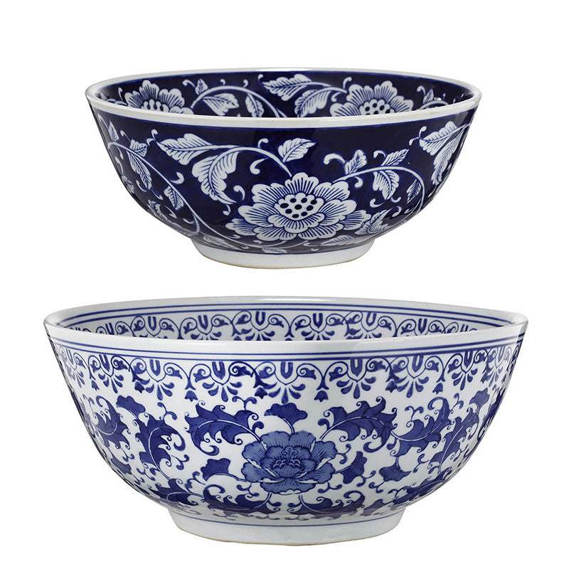 White porcelain Aline decorative bowl with blue floral patterns on a white background.