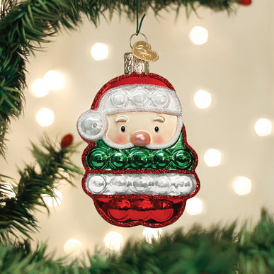 Santa Popper Ornament with red, green, and white bubble rows hanging on a Christmas tree.