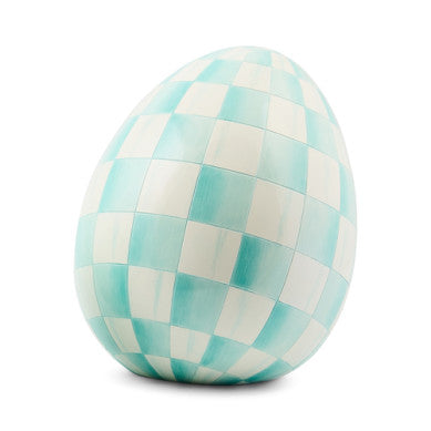 Small resin egg sculpture with a speckled natural finish