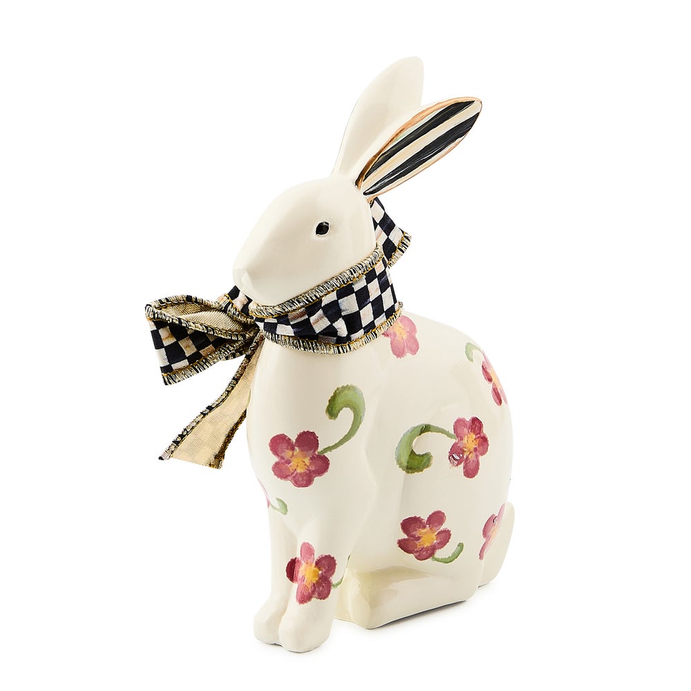 Handmade resin floral rabbit figurine with pastel colors and a whimsical silhouette.
