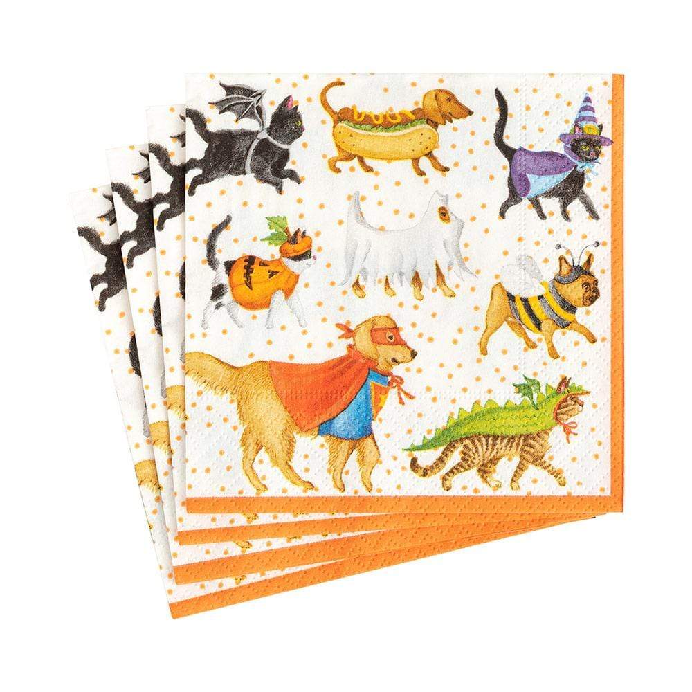 Packaged cocktail napkins with printed designs on triple-ply material.