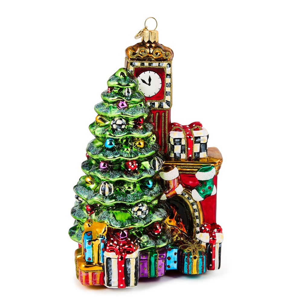Hand-painted glass fireplace ornament featuring a Christmas tree, clock tower, and gifts.