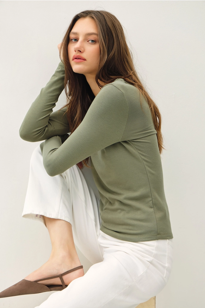Audrey round neck long sleeve knit top in soft stretchy material with relaxed slim fit silhouette