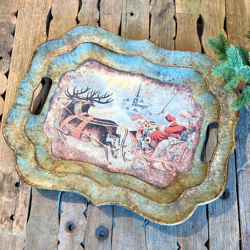 Vintage-style Santa on Sleigh tray with scalloped edges and a rustic blue and gold finish.