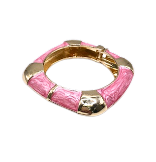 Square-shaped gold-tone hinged cuff bracelet with pink marbled enamel sections.