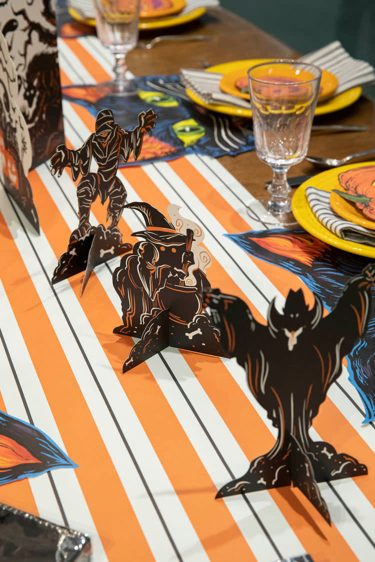 White paper table runner with black stripe pattern