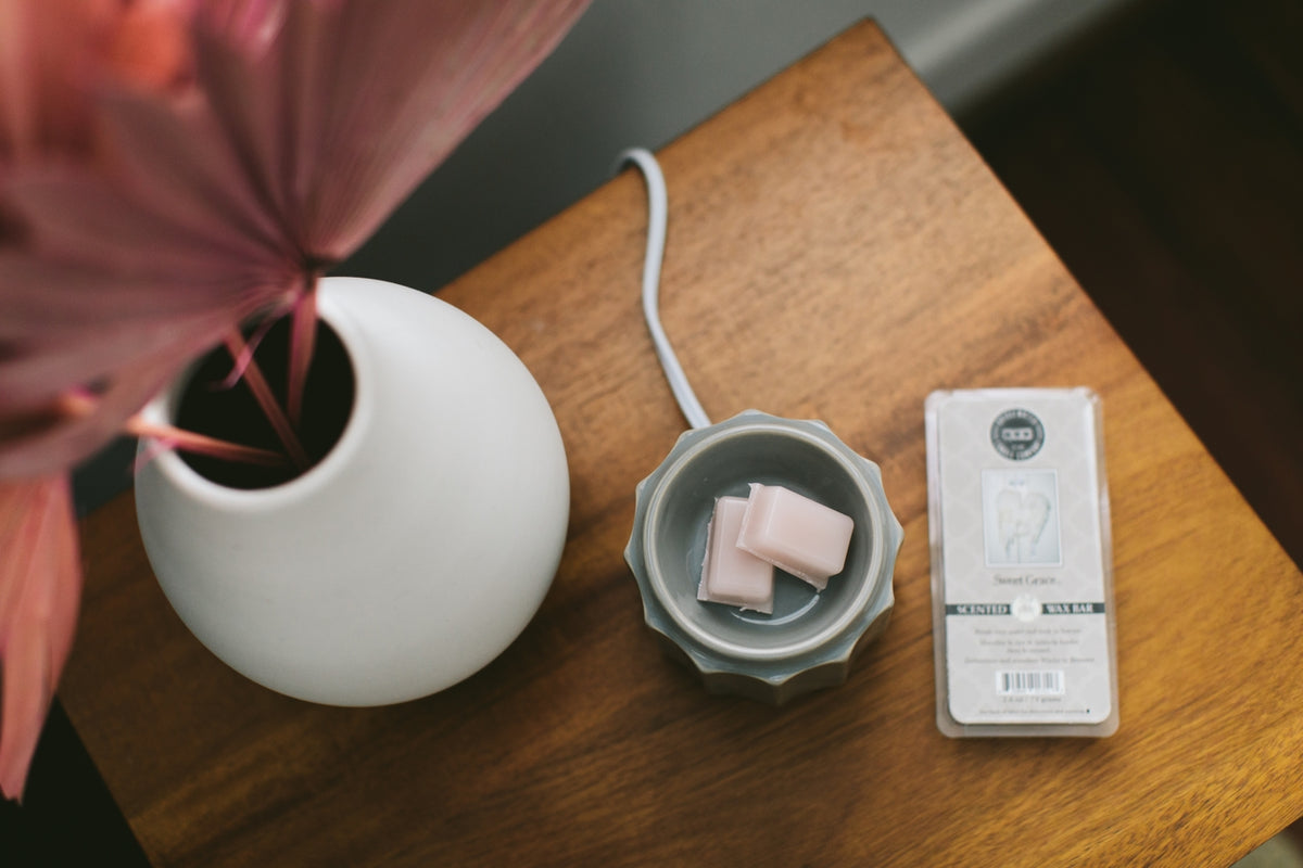 Sweet Grace wax bar in a neutral tone with tea and patchouli notes