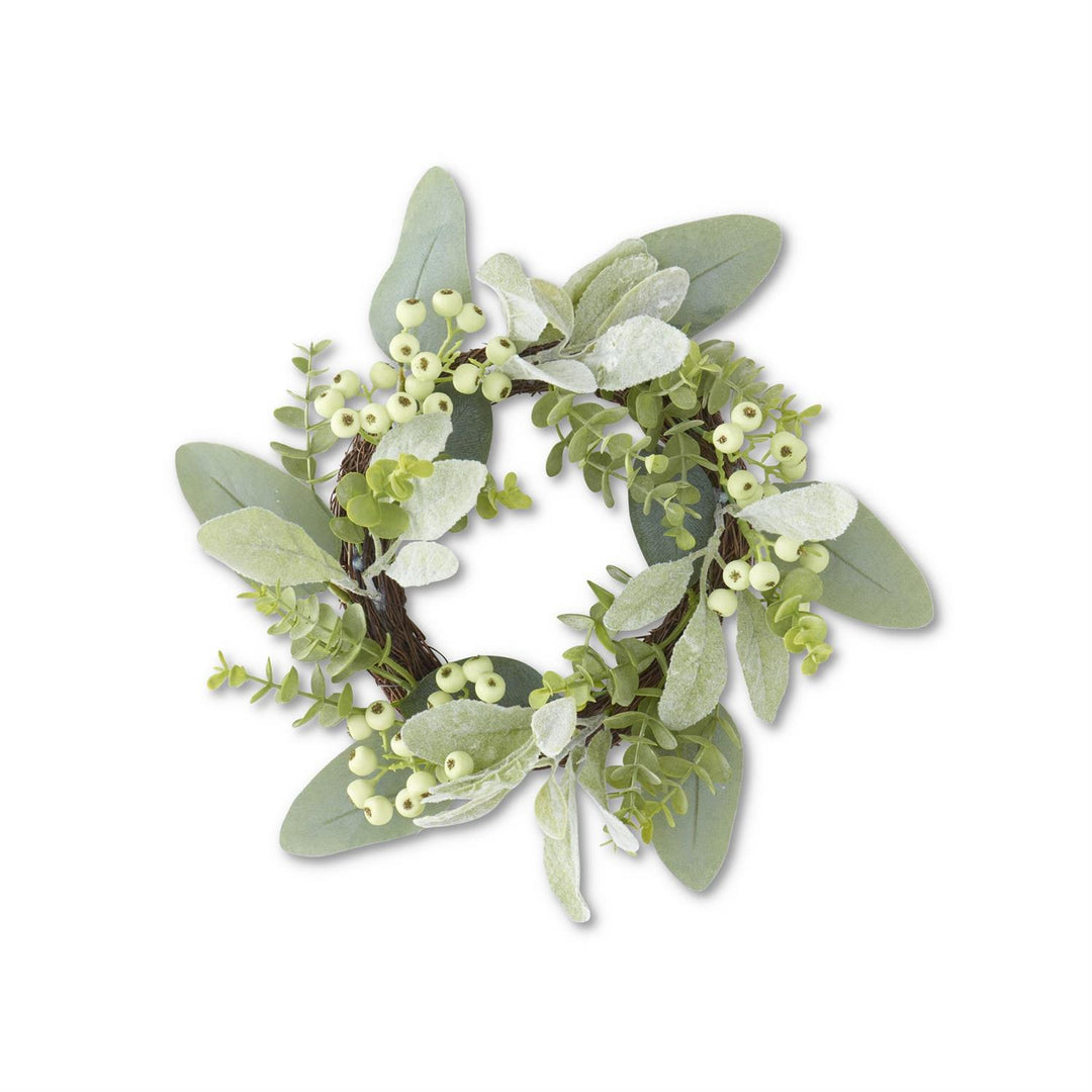 Candle ring with mixed green foliage and berries in polyester, plastic, twig, polyfoam.