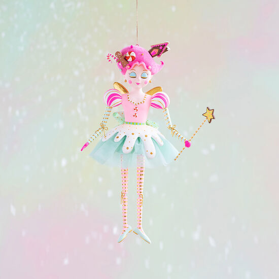 Resin Sugar Plum Fairy figure with pink top, blue-green skirt, hot-pink hair topped with gingerbread house and candies.