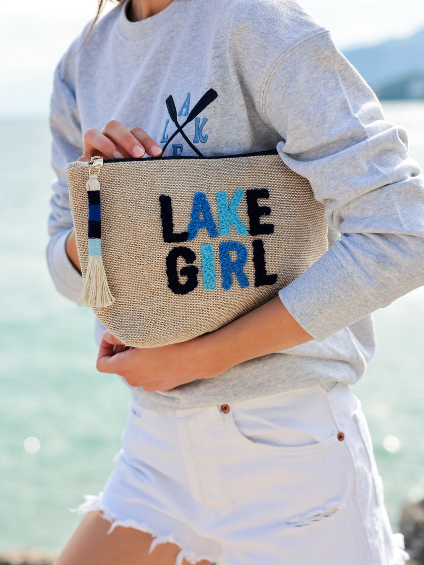 Natural Lake Girl zip pouch with a subtle textured surface.
