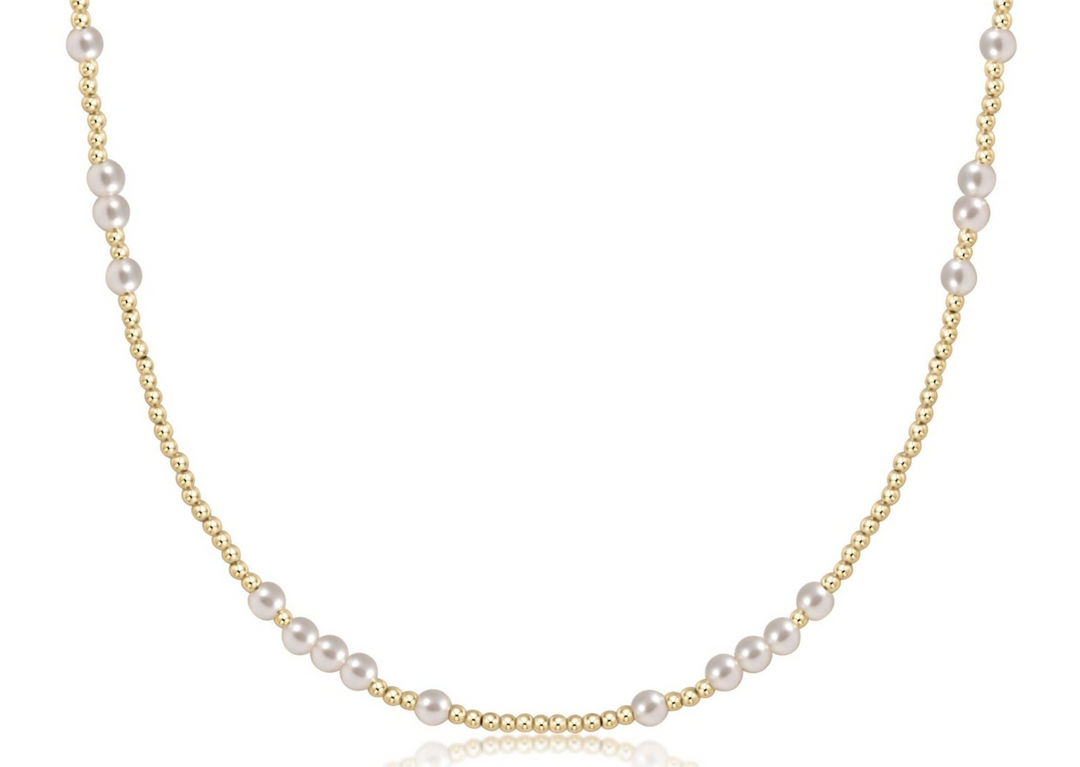 15-inch choker featuring 2mm 14kt gold-filled beads and 4mm white crystal pearls.