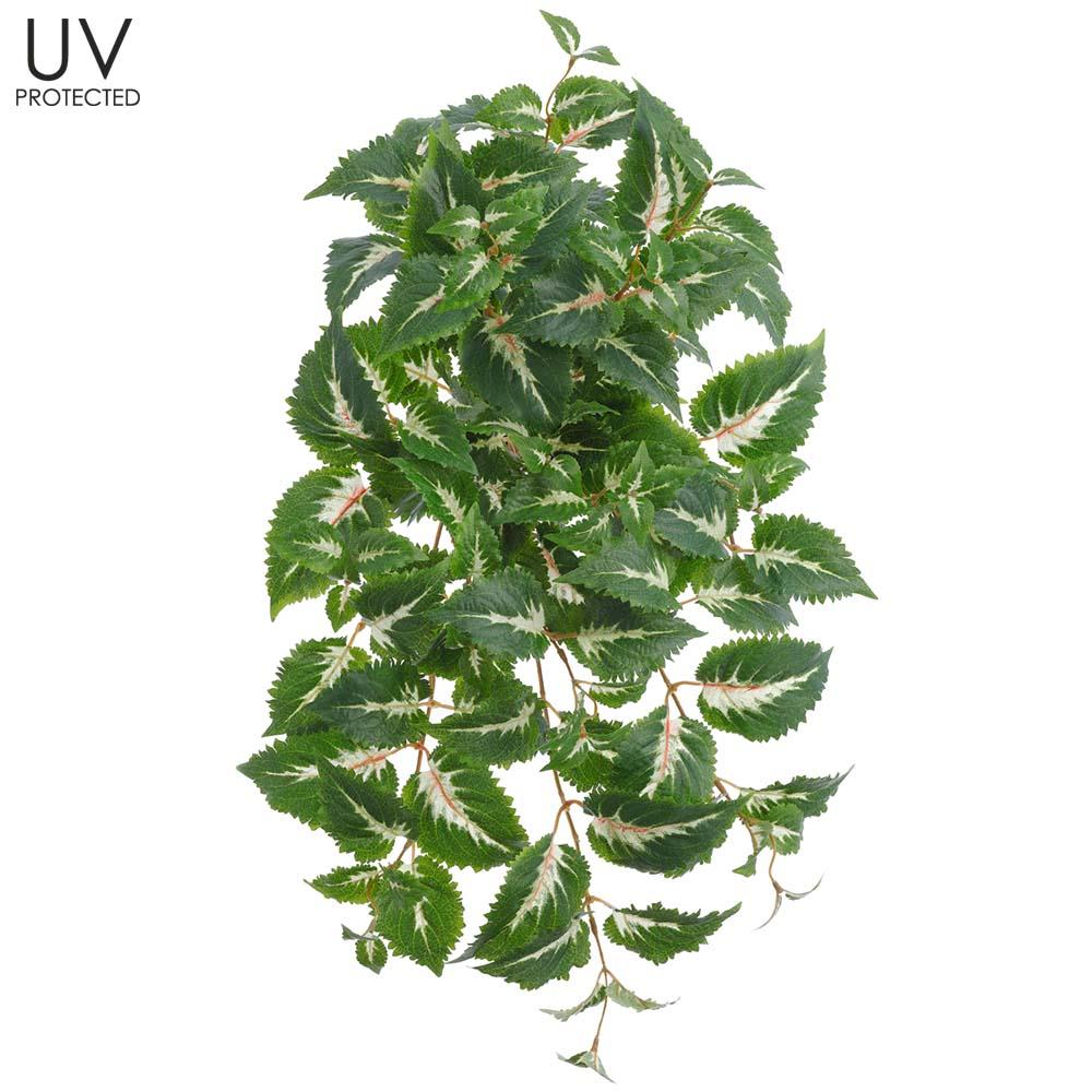 Hanging artificial Coleus bush with vibrant green foliage in a dark metal wire frame.