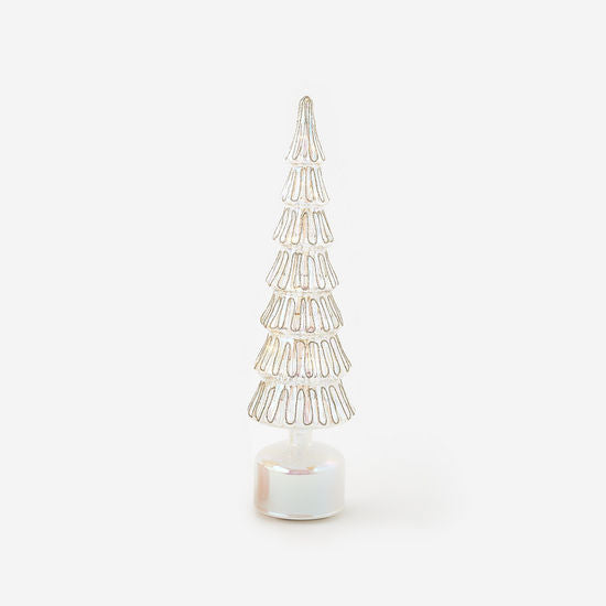 16.5 inch revolving lighted glass Christmas tree with a white iridescent finish on a round base.