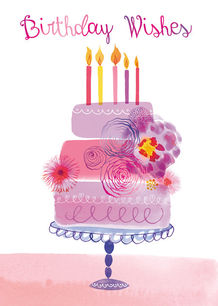 Artistic three-tier pink and purple cake with five candles and flowers on a blue cake stand.