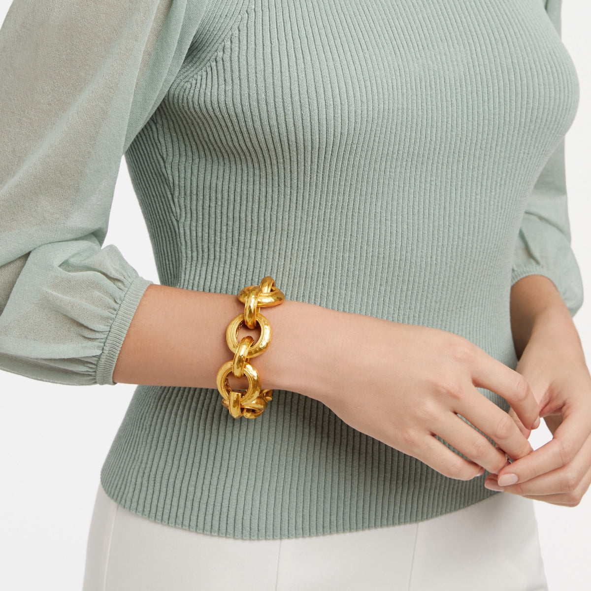 Cannes Link Bracelet in hammered gold with a pierced interior toggle closure
