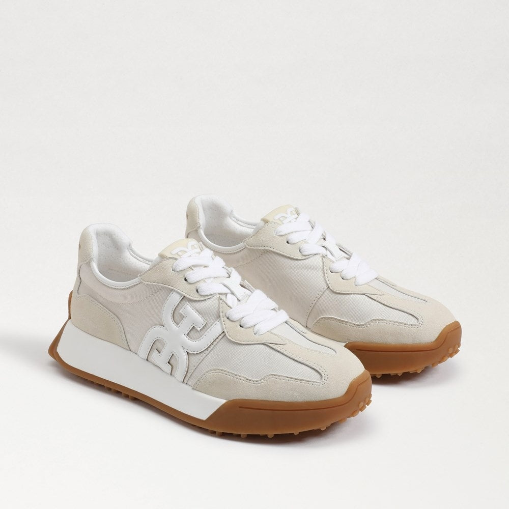 Langley lace-up sneaker with rounded toe in custom-dyed leather and fabric materials.