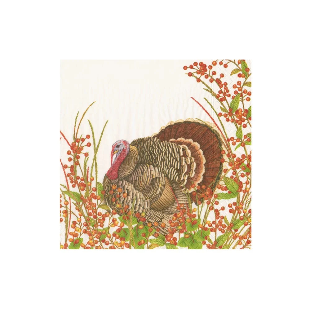 Caspari cocktail napkin featuring a detailed illustration of a wild turkey among red berries.