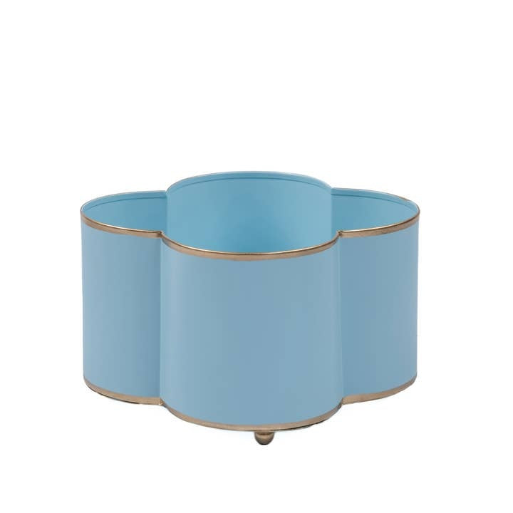 Mattie quatrefoil cachepot planter with gold trim feet holding four small pots