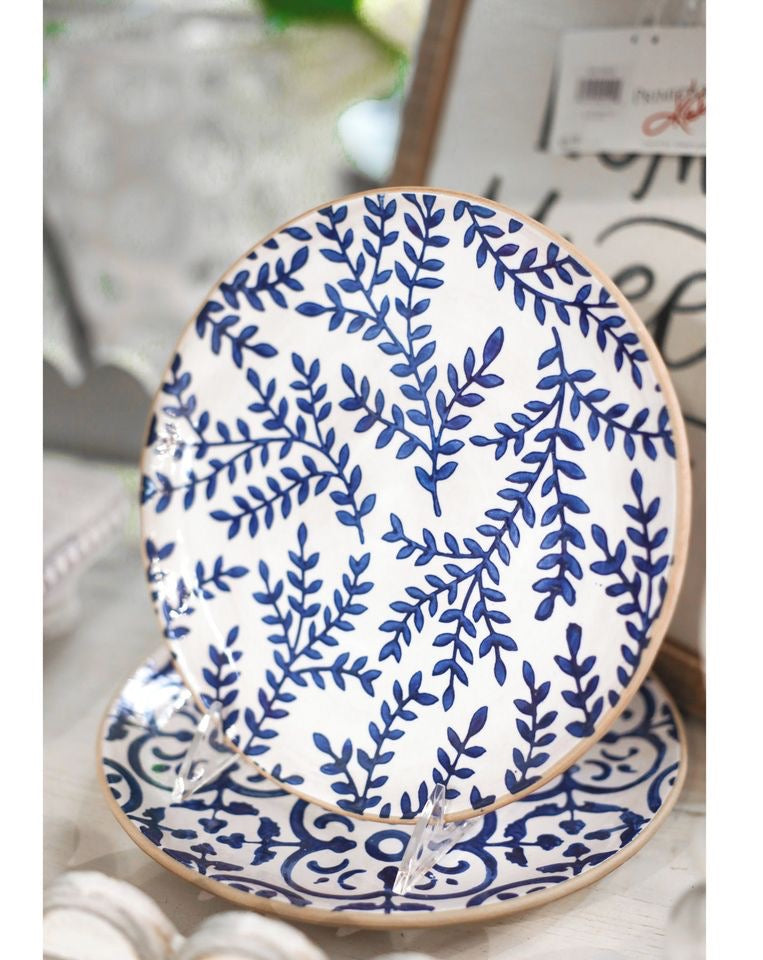 Indigo salad plates with a deep blue glaze and simple round shape