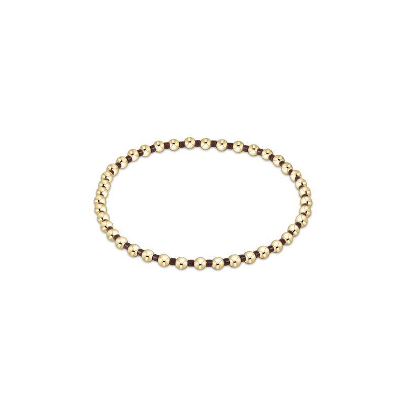 Hope Grateful bracelet featuring mixed 2mm seed beads in spring colors with gold-filled accents on elastic cord.