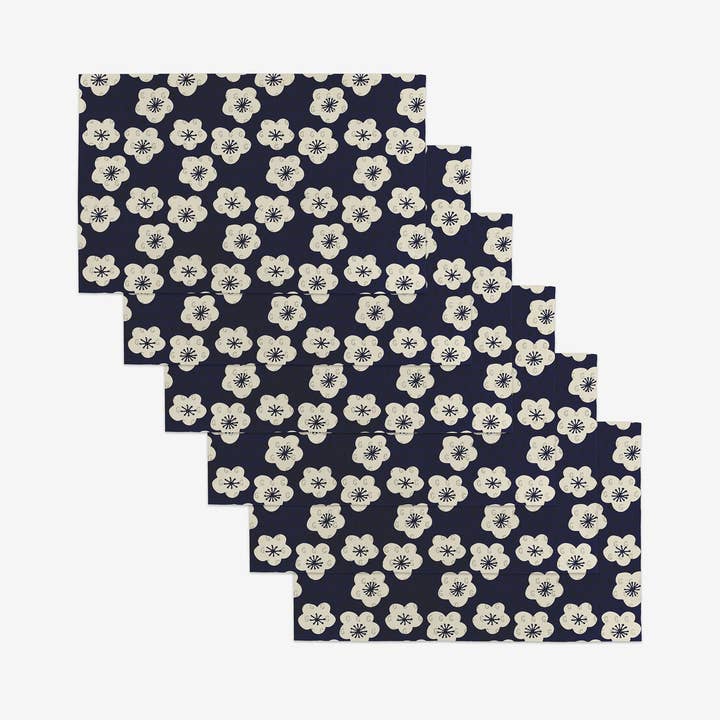 Set of reusable kitchen cloths made from post-consumer recycled materials in a neutral tone.