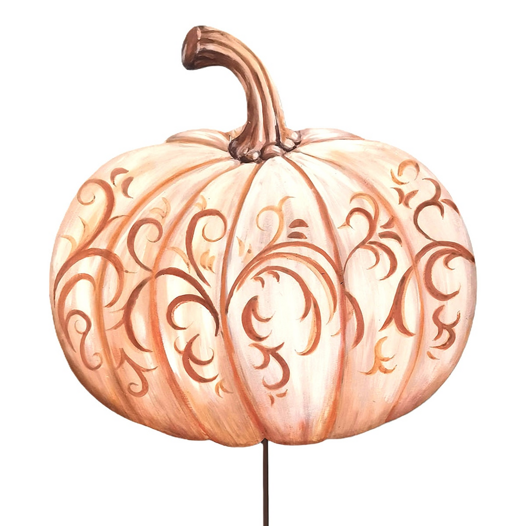 Cream-colored pumpkin with brown chocolate scroll patterns and a curved brown stem.