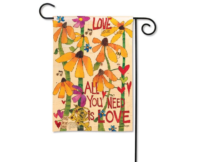 Garden flag with orange and purple flowers, hearts, and the text "All You Need Is Love".