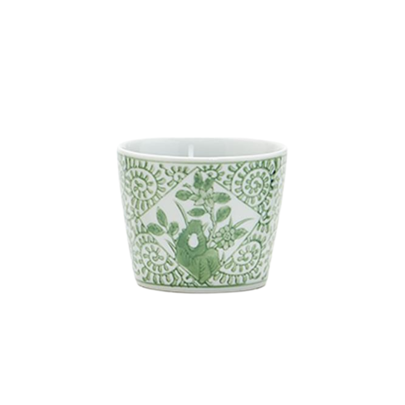 Small white porcelain cachepot with green floral and spiral patterns, sold individually.