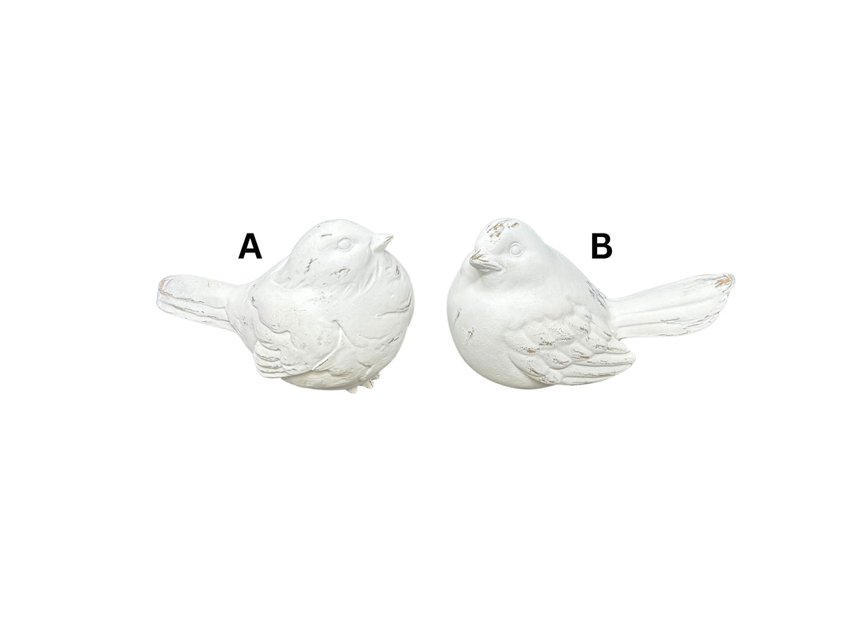 Two large resin whitewashed bird figurines in different poses, labeled A and B.