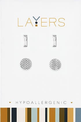 Silver rectangular cubic zirconia stud paired with a trax circle hoop earring