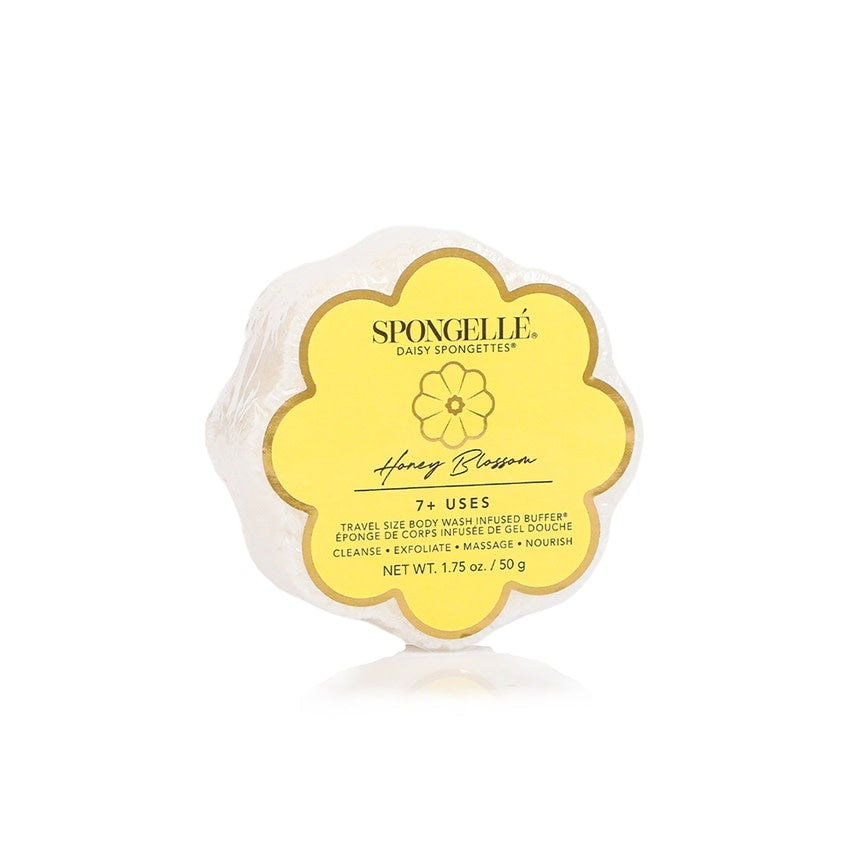 Daisy Collection Spongette body wash infused sponge with built-in cleansing buffer in soft beige tone.
