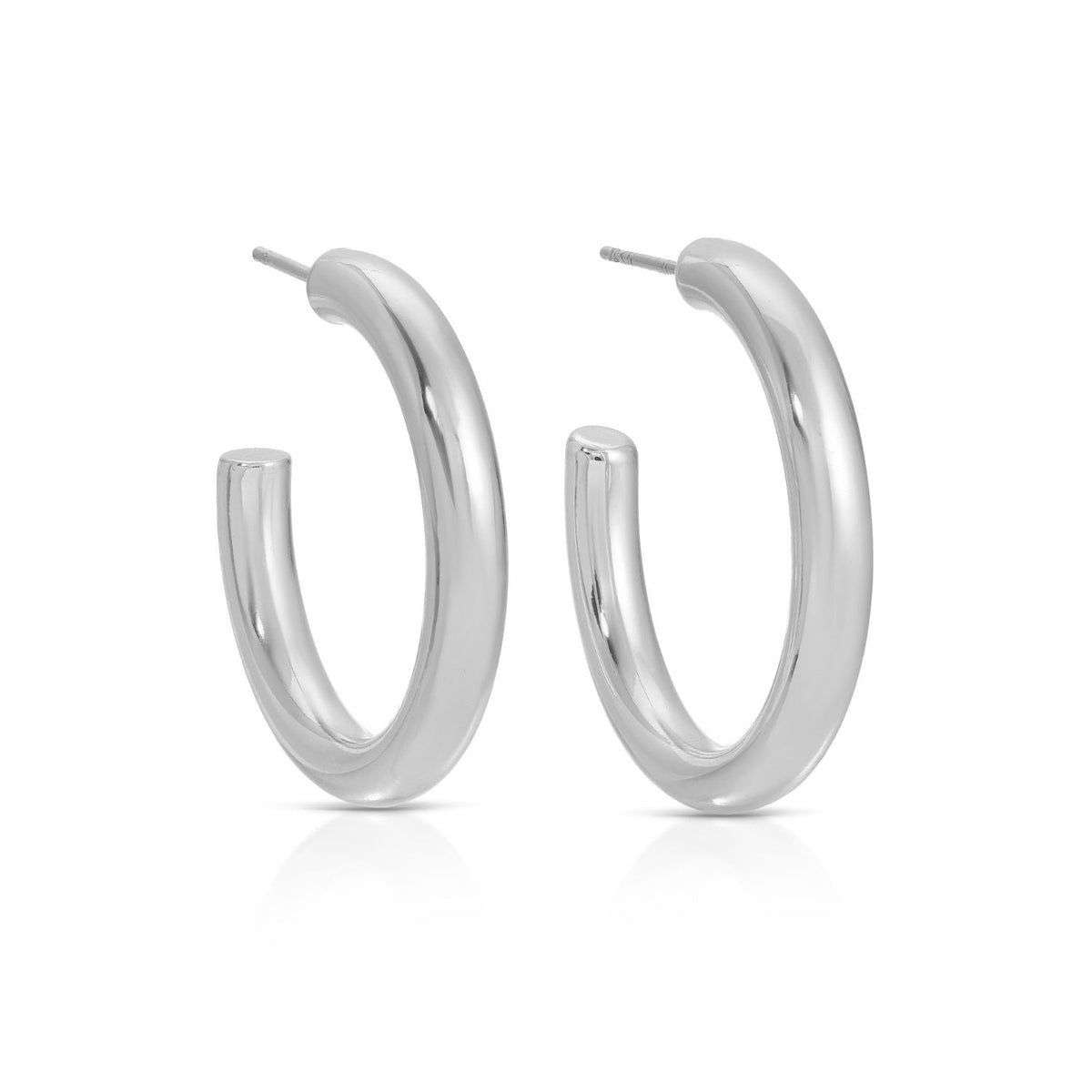 Brass hoop earrings with a smooth circular silhouette.