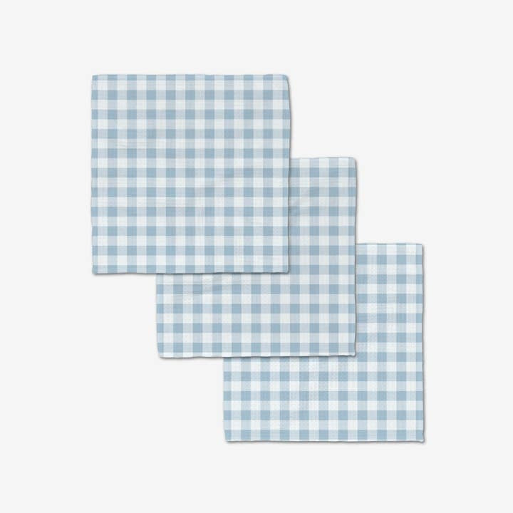 Set of waffle weave washcloths with single-sided prints and hang loops.