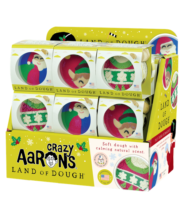Crazy Aaron's Land of Dough holiday-themed play dough display with Santa and elf designs.