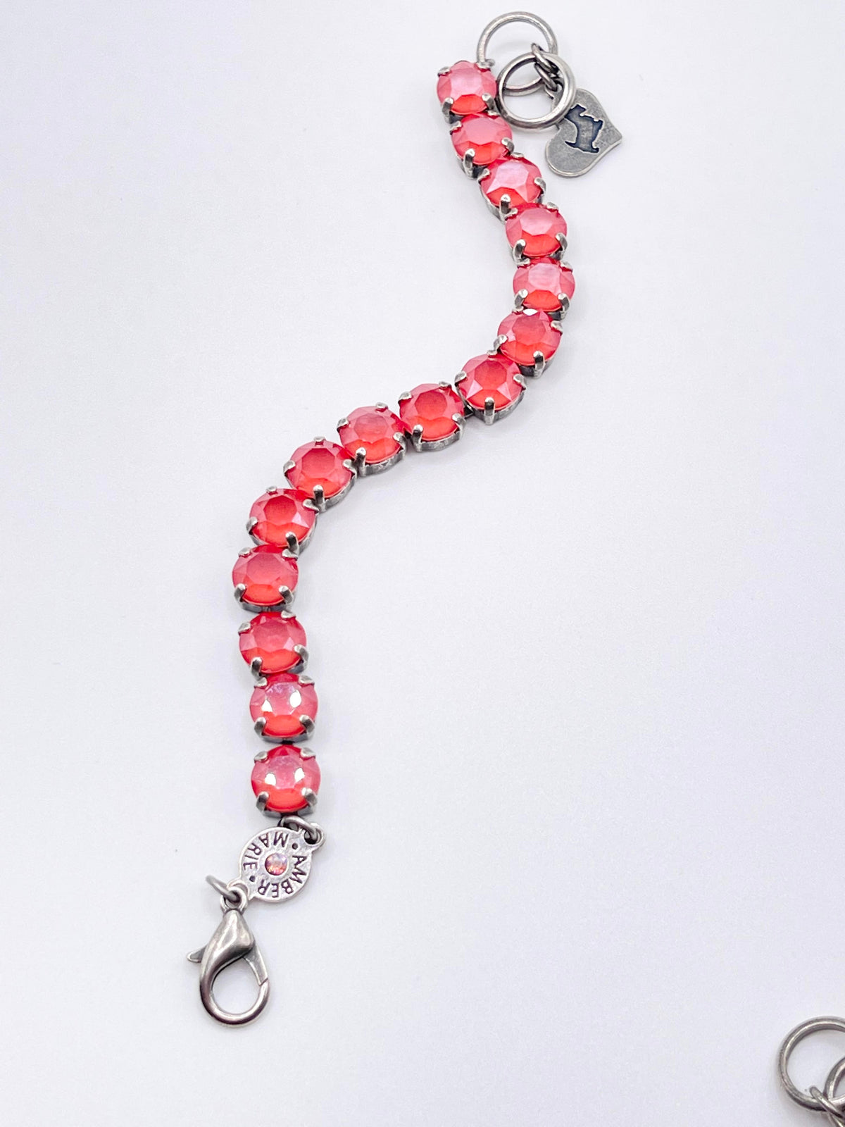 Adjustable silver-tone bracelet featuring a Scotty dog heart charm