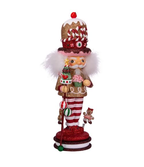 Wood composite Gingerbread King Nutcracker with peppermint hat, striped pants, and gingerbread figures on base.