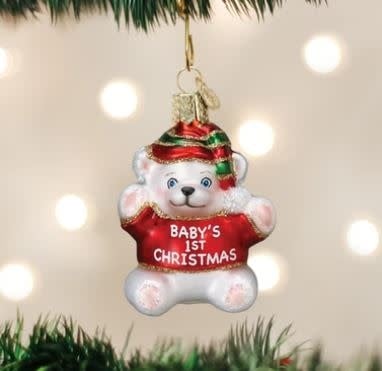 Baby's first Christmas ornament shaped like a brown teddy bear with black button eyes and stitched features.