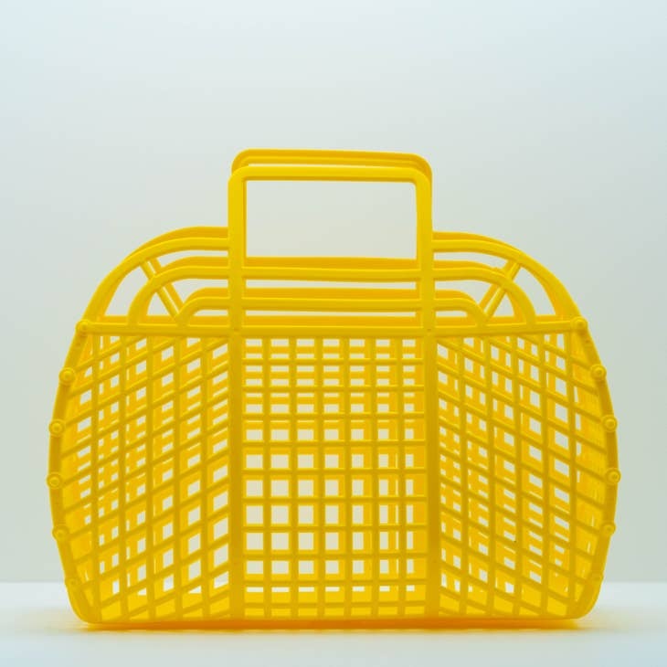 Large retro jelly basket in translucent blue with snap-bead construction.